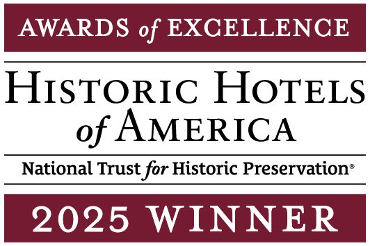 Historic Hotels of America 2025 Awards of Excellence Winner badge, awarded to Napa River Inn by the National Trust for Historic Preservation.